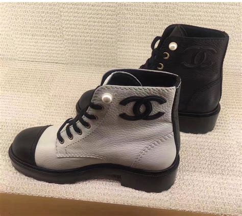 chanel black canvas heel boots.